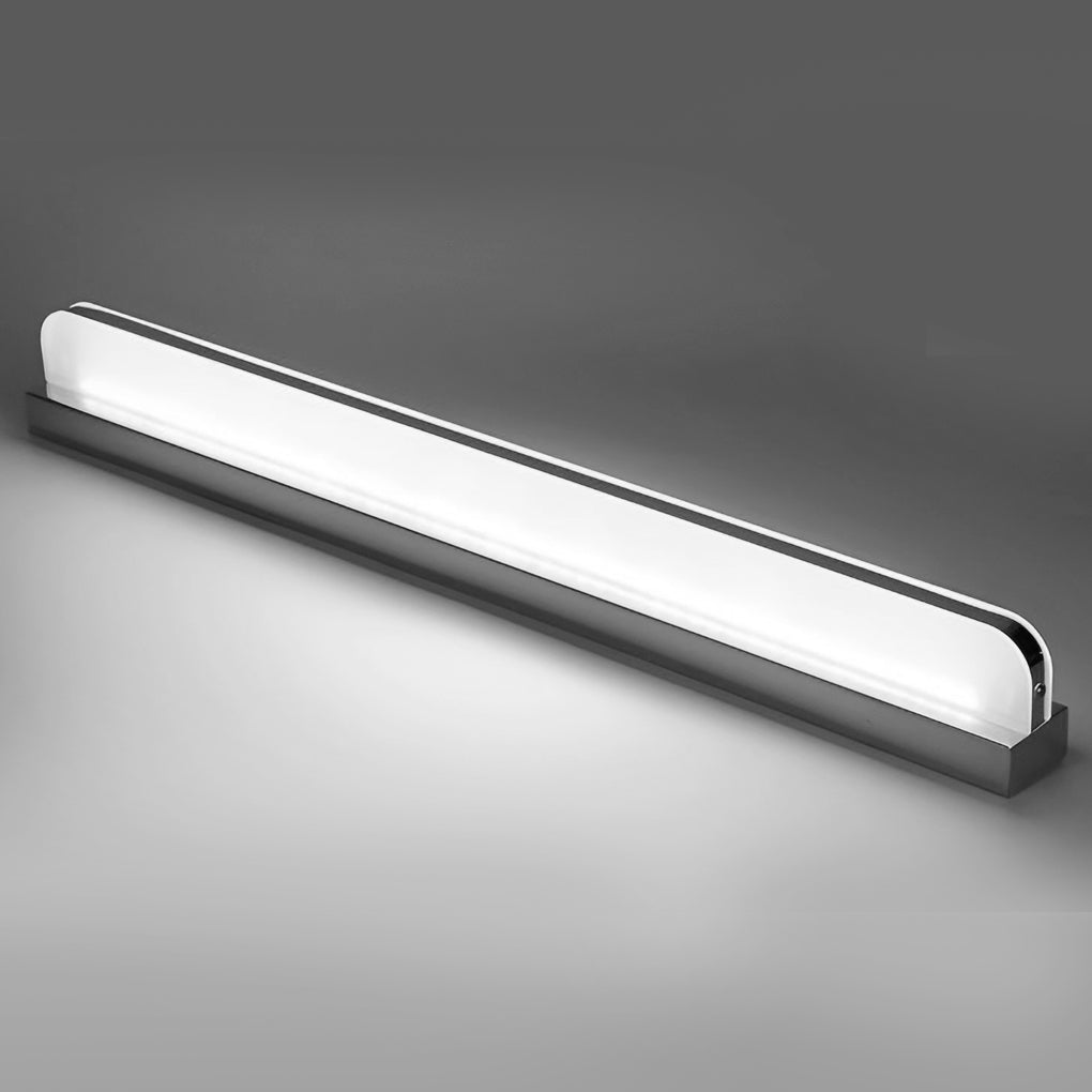 LED vanity bar light in silver above a bathroom mirror in a modern minimalist bathroom