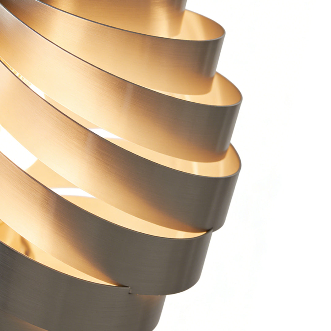 Close-up of the Aureon swirl pendant light showing the layered turbine aluminium detail