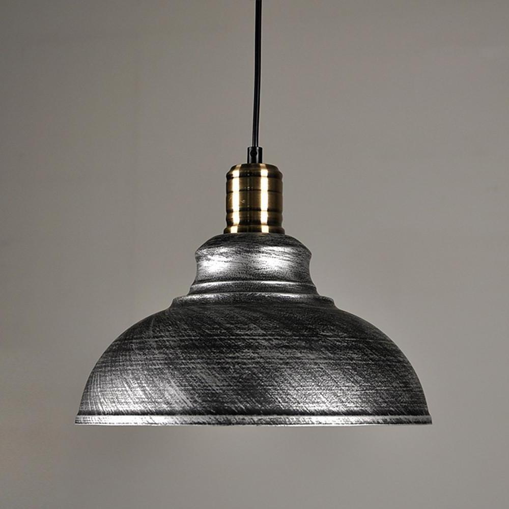 Aureon silver dome pendant light hanging above a home office desk, single-light metal pendant