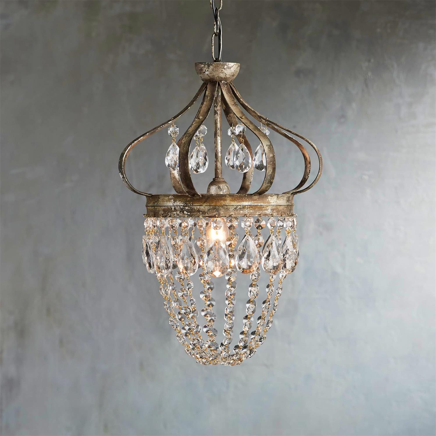 Small crystal chandelier D 27 cm in antique silver above a bedside table