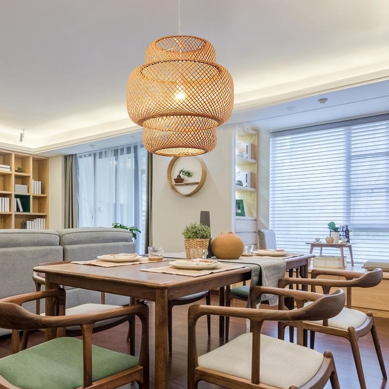 Woven bamboo pendant light with three-tier shade detail, natural finish