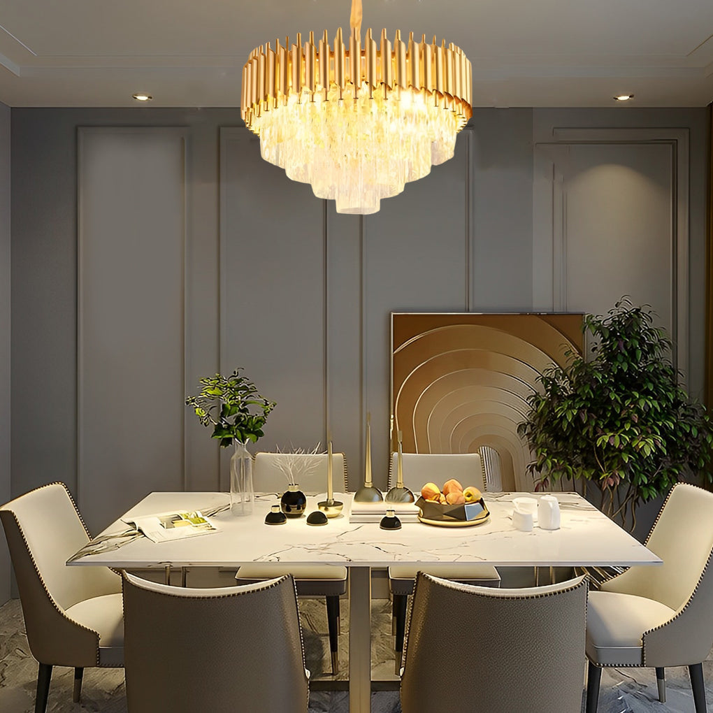 Auréline gold chandelier illuminated, warm 3000K colour temperature in living room setting