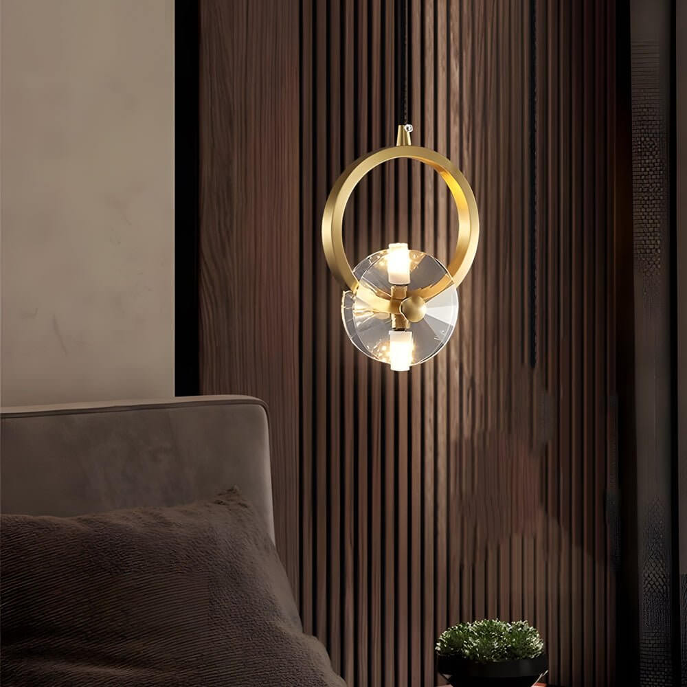 Polished copper ceiling canopy and adjustable wire of the Aureon crystal pendant light