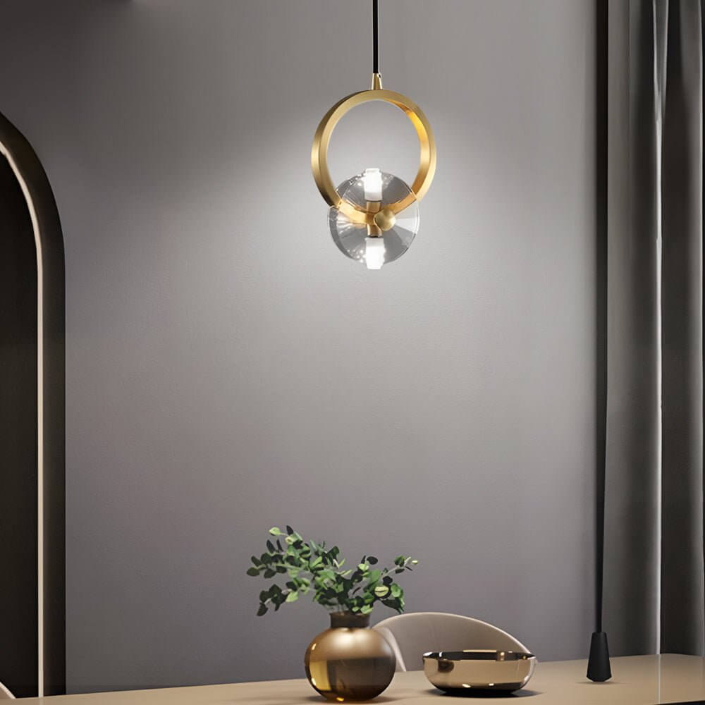 Aureon 3-light crystal pendant light in polished copper finish, lit warm white