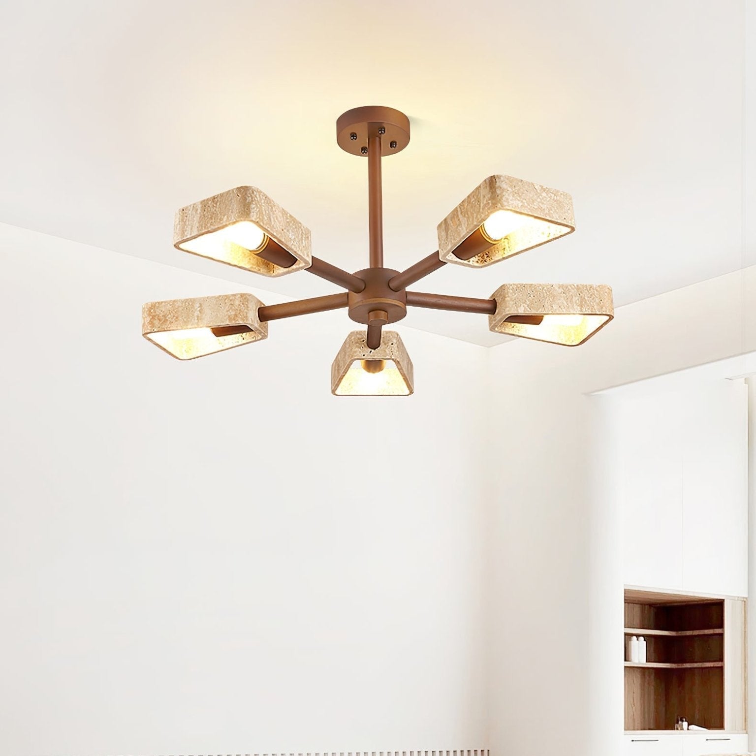 Open-frame travertine and wood chandelier in a Wabi-Sabi styled entry hallway
