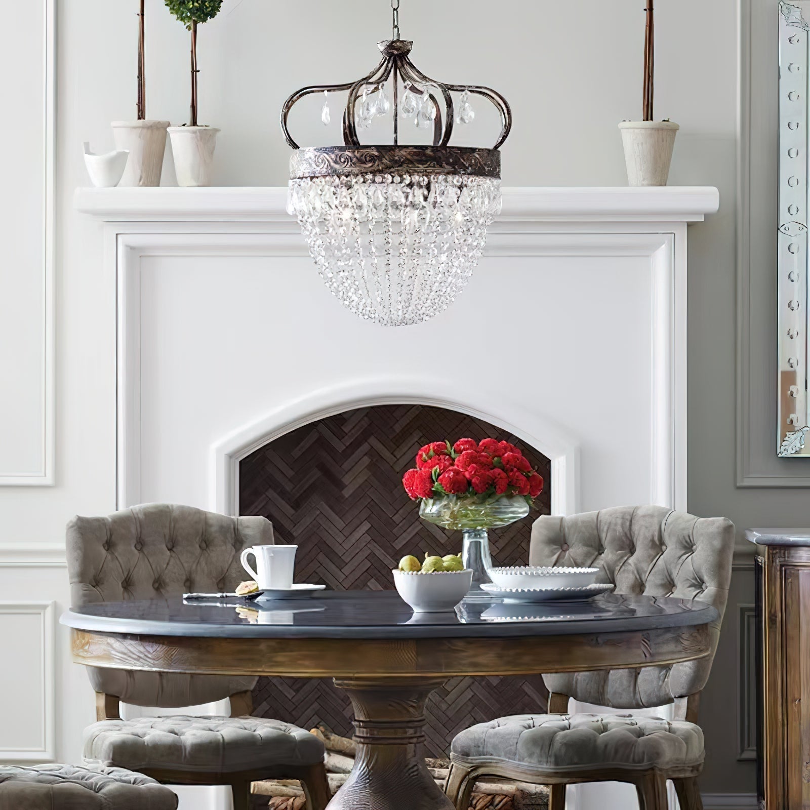 Crystal teardrop chandelier antique gold in a contemporary styled room