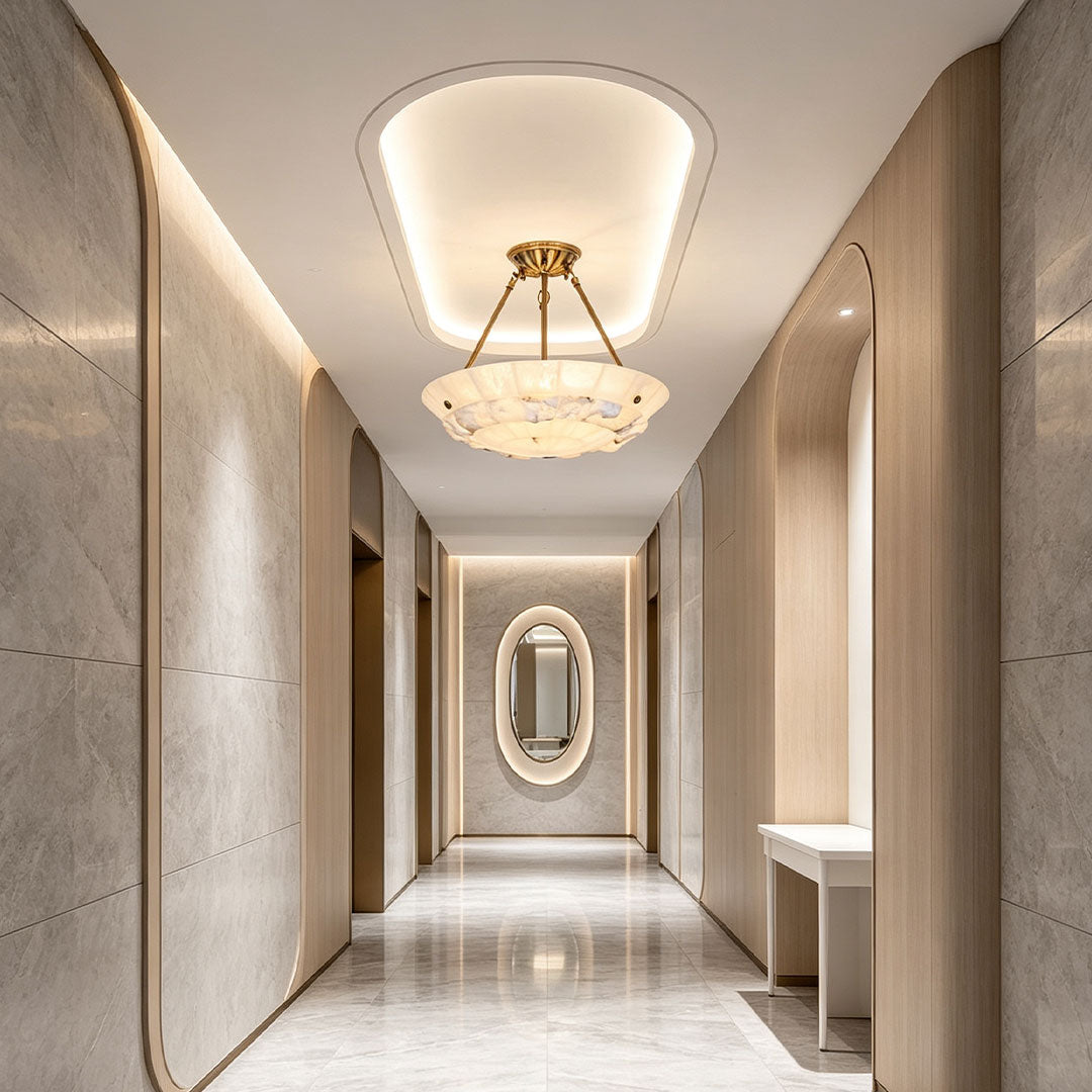 Auréline brass alabaster chandelier in an open-plan living and dining space