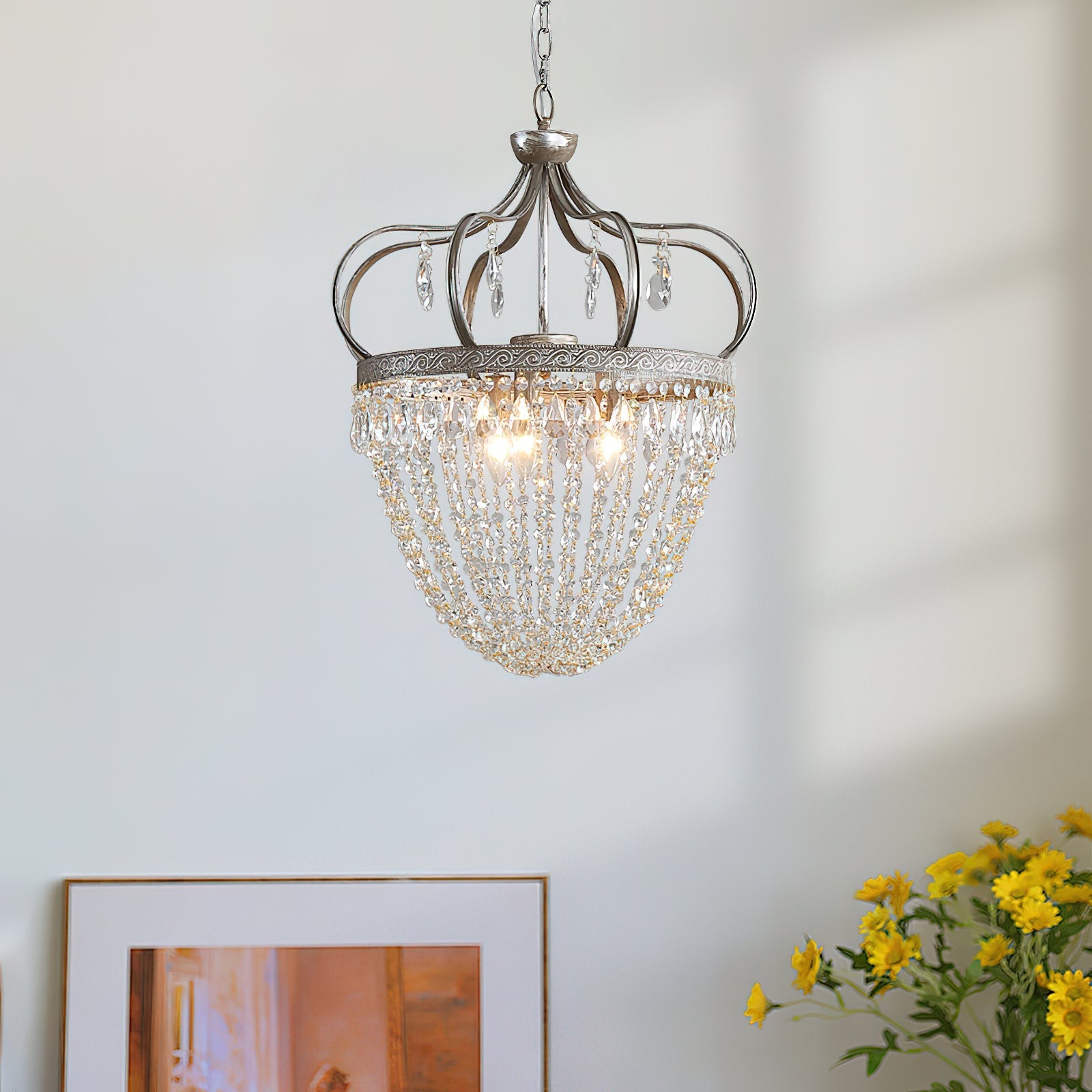 Vantara crystal chandelier installed above a kitchen island in a contemporary home