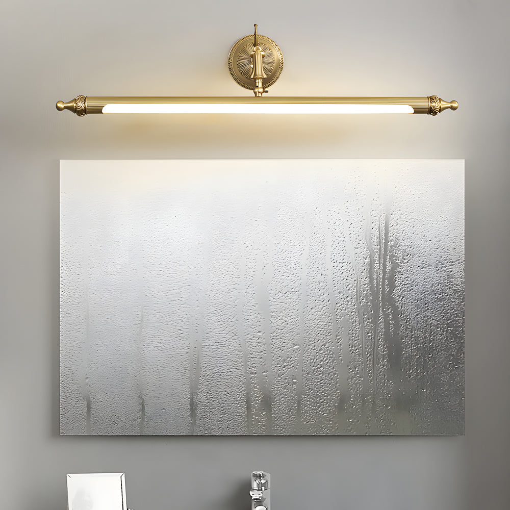 Close-up of Viora vanity light bar showing copper body and brushed gold finish
