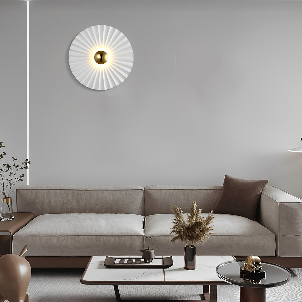 Alure LED wall light in white iron, lit, showing warm 3000K glow in a bedroom setting