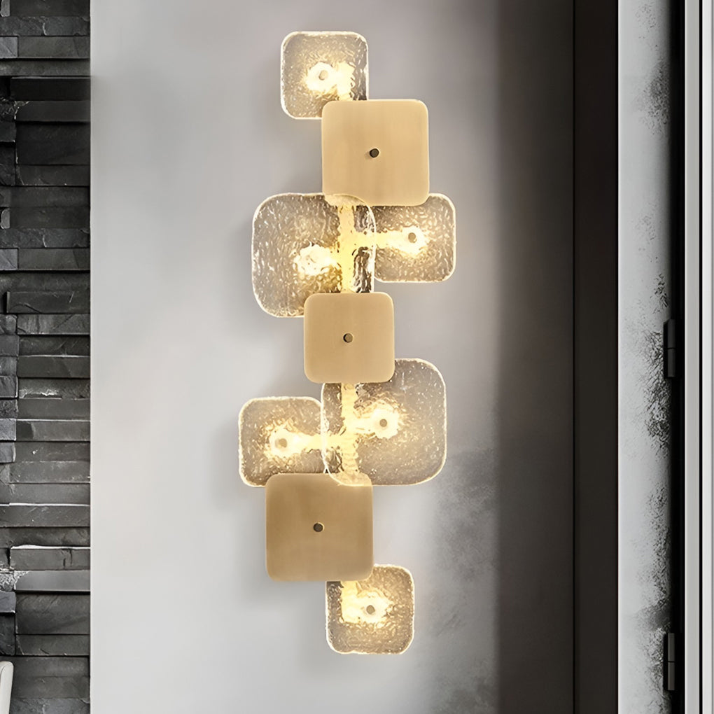 Alure copper wall sconce mounted on a neutral interior wall