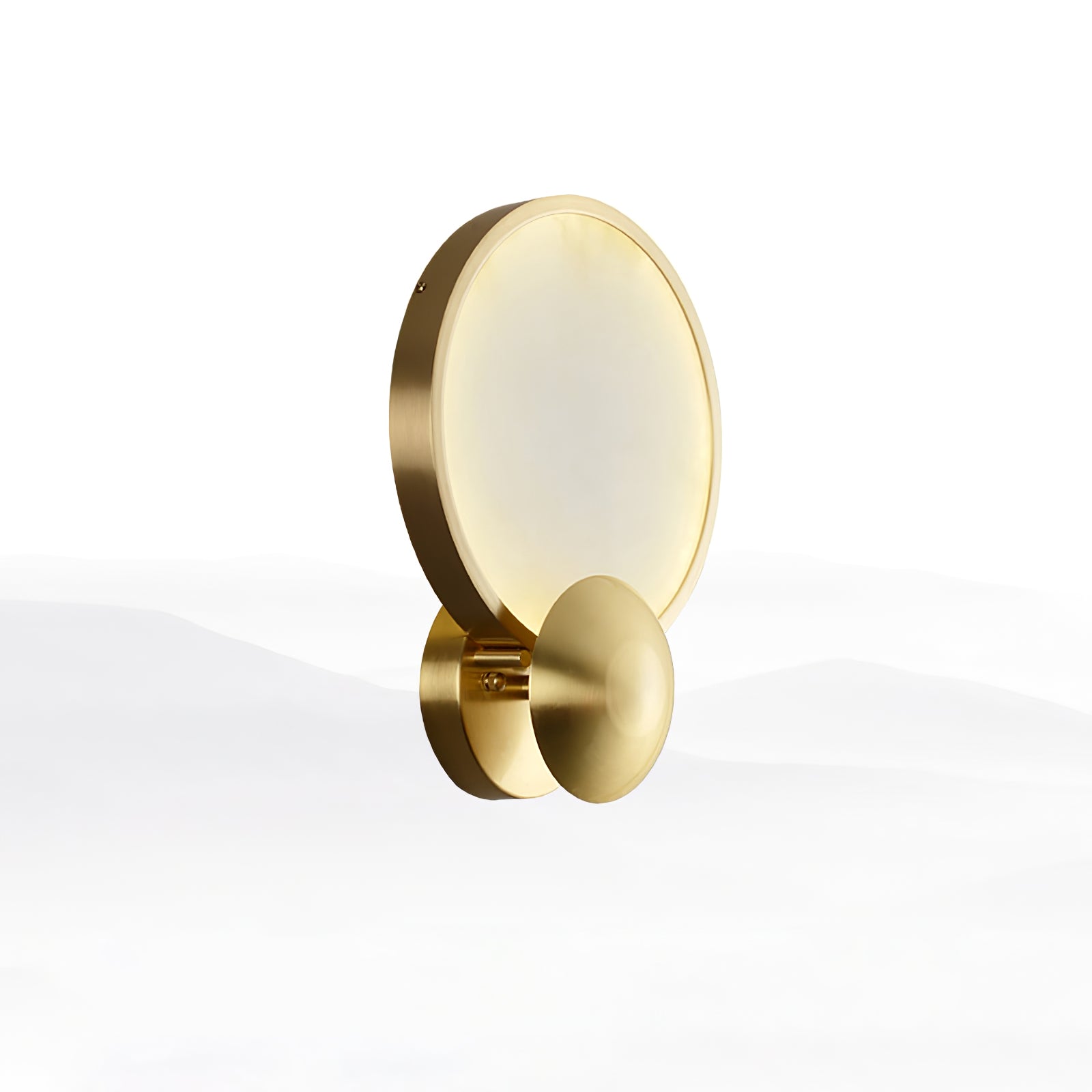 Sayo stone wall light casting a soft Sayo of warm light on a textured plaster wall