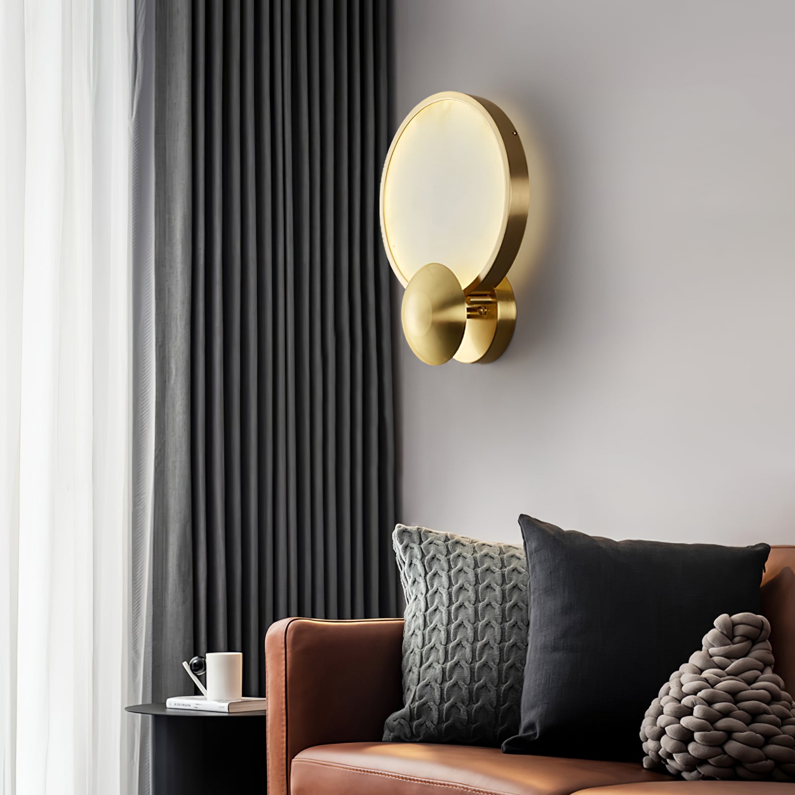 Sayo Sayo wall light casting warm diffused light in a calm living room setting