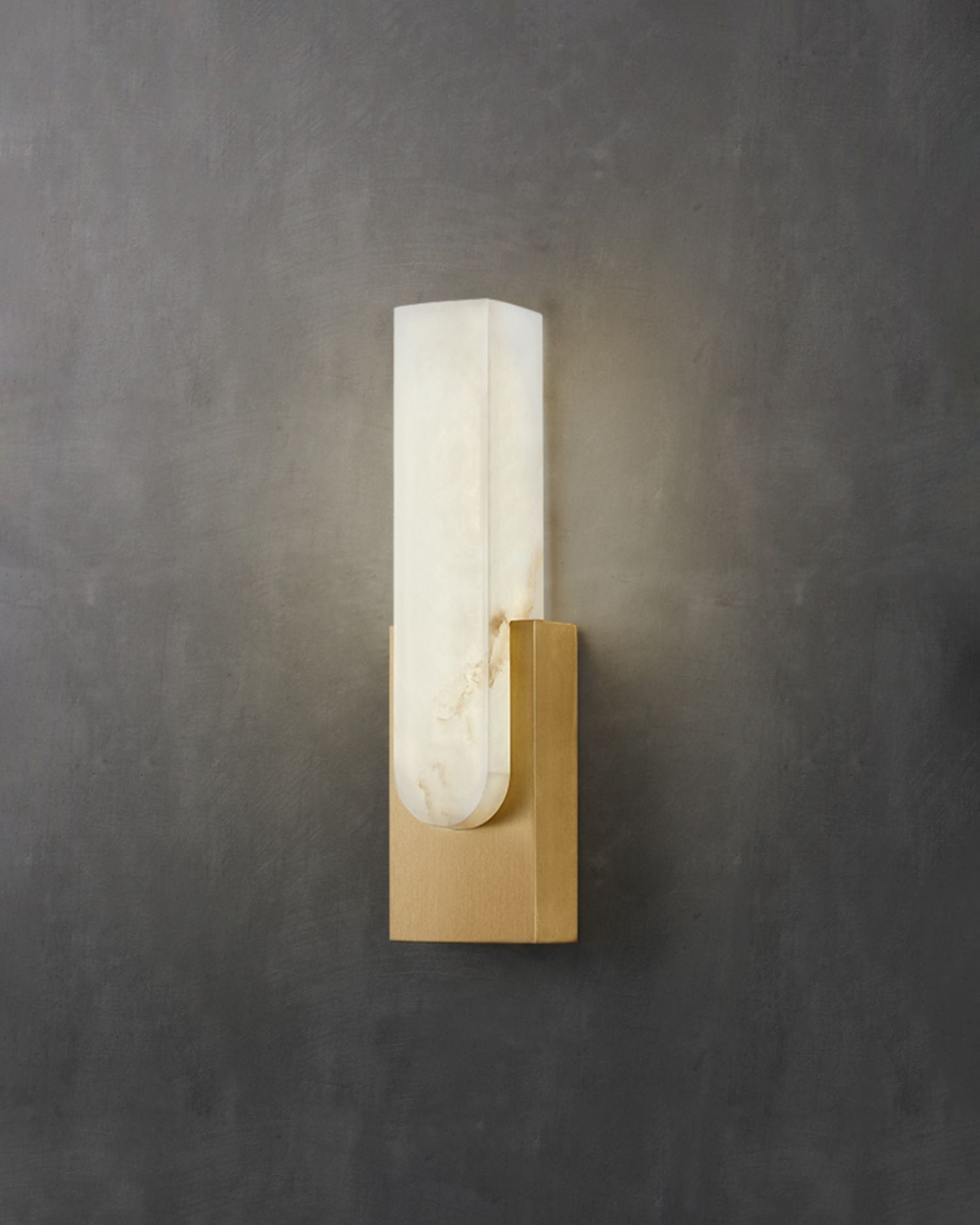 Iwara Wall Light in black finish installed in a bathroom as a damp-rated indoor wall sconce