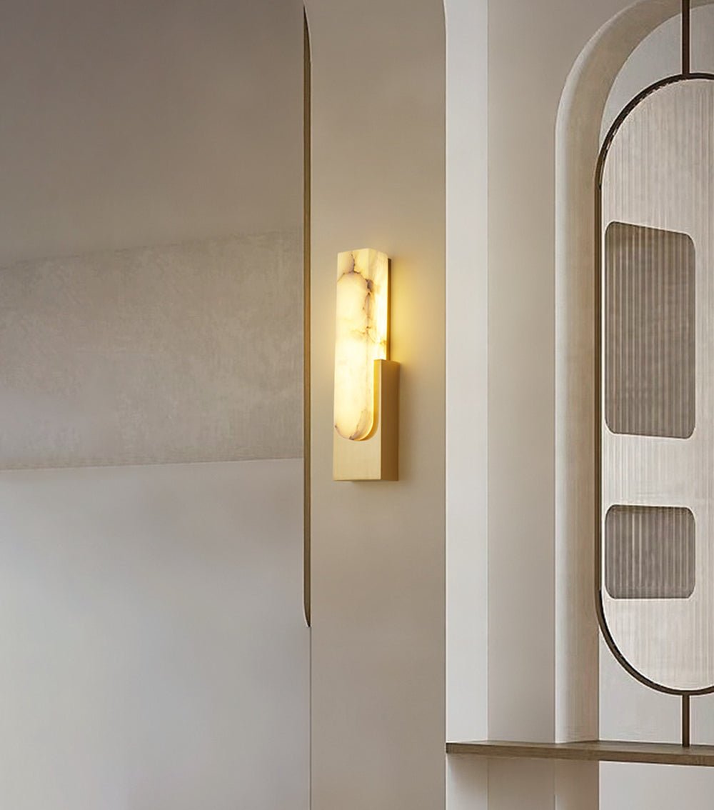Pair of Iwara Iwara Wall Lights flanking a headboard in a calm, minimal bedroom