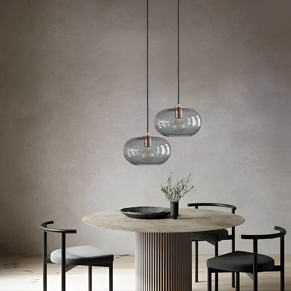 Aureon pendant light from above, showing ceiling canopy and adjustable cord