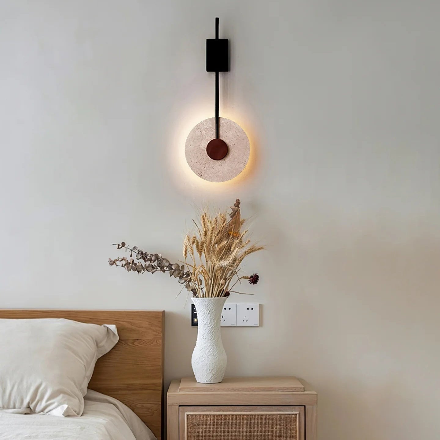 Tovi stone wall light illuminated showing warm 3000K colour temperature
