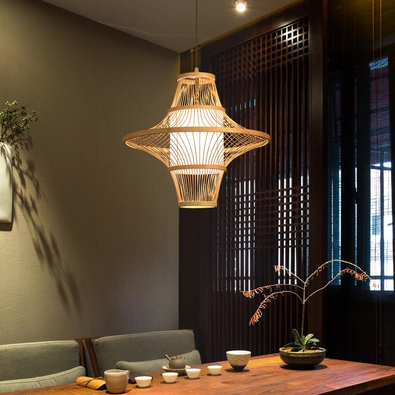 Aureon dual-cone bamboo pendant light in a warm natural burlywood finish, front view