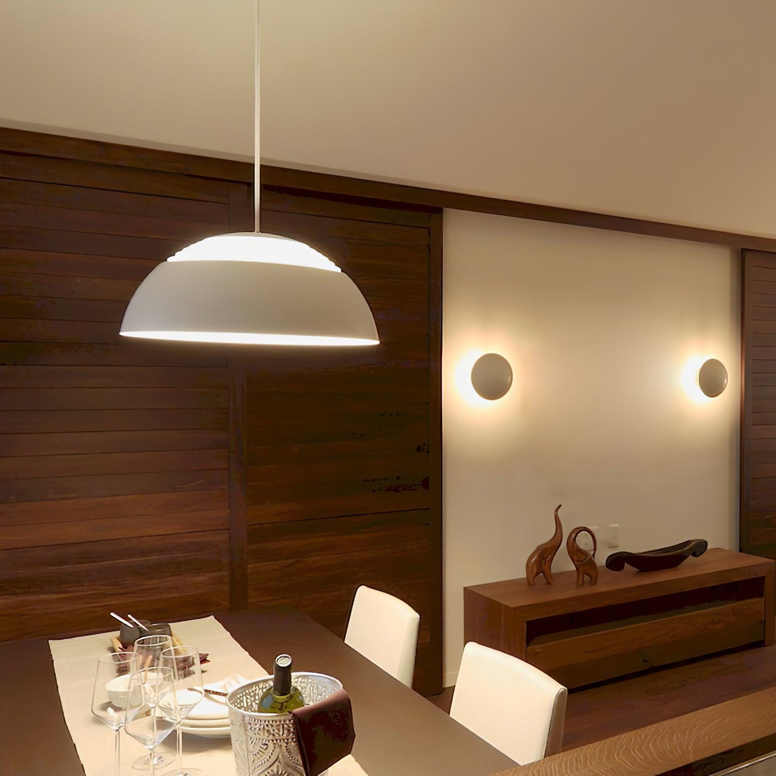 Vantara drum pendant light in matte white in a modern Scandinavian-influenced kitchen interior