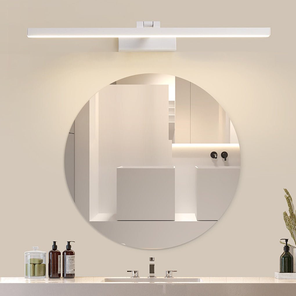 Viora LED bath bar vanity light mounted above a bathroom mirror, white finish