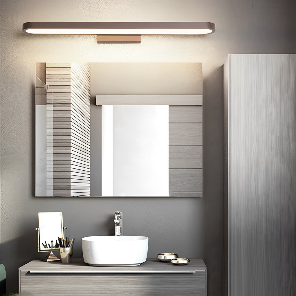 Viora bathroom vanity light shown during wall installation above a modern mirror