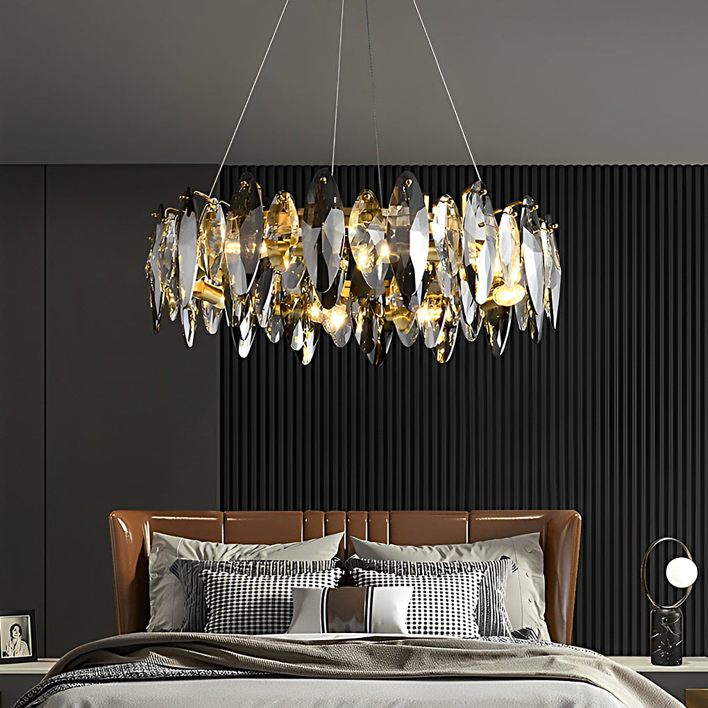 Bedroom crystal chandelier with warm amber glow from K9 smoke grey glass shades