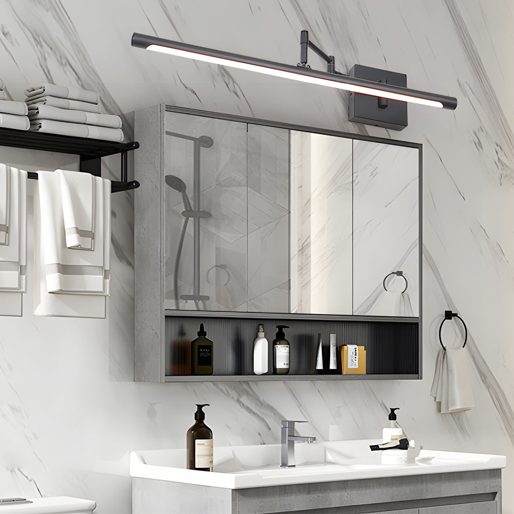 Viora adjustable swing arm vanity wall light in matte black above a bathroom mirror