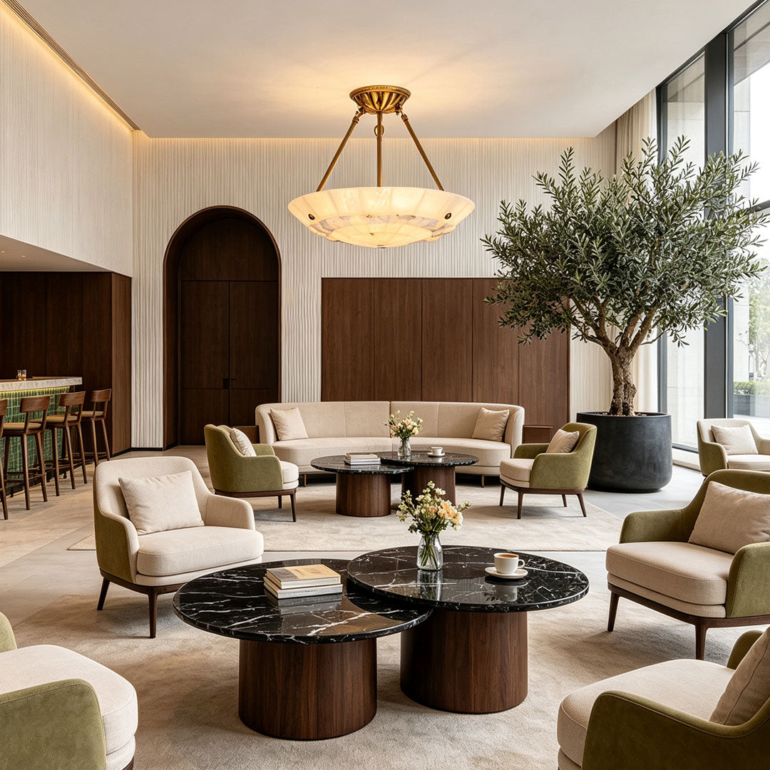 Auréline alabaster bowl chandelier in a bedroom setting, modern brass ceiling light