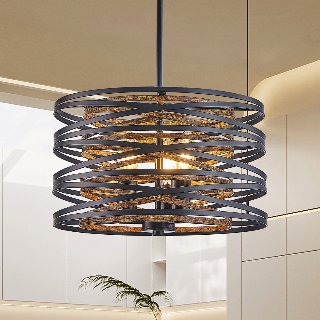 Aureon black drum pendant light installed in a bright modern kitchen