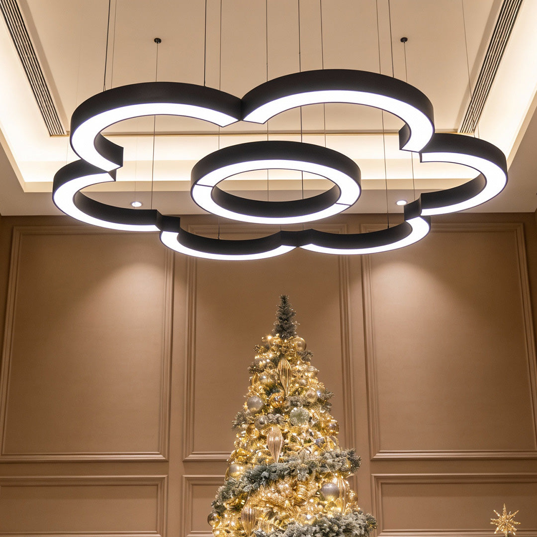 C-shape arc LED pendant light in a modern interior, black iron frame with acrylic diffuser