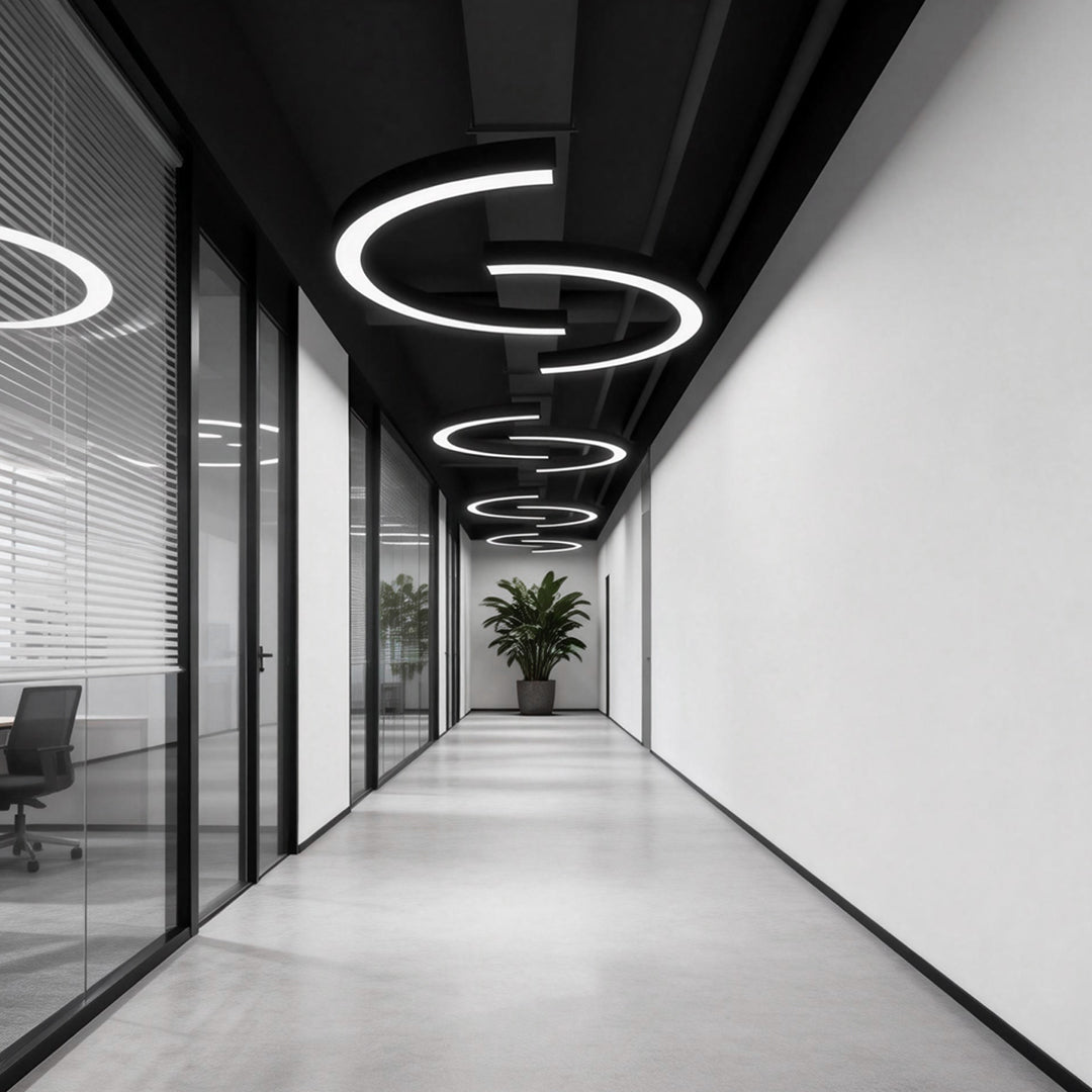 Aureon C-shape pendant light in a minimalist corridor showing clean curved profile