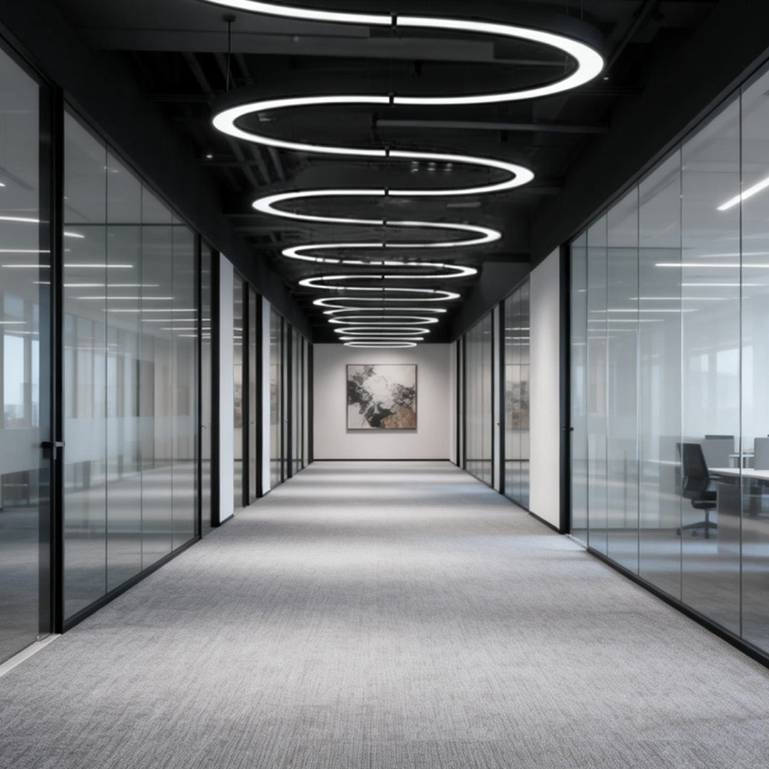 Aureon semicircular pendant lights in an office hallway, downward 6000K white light beam