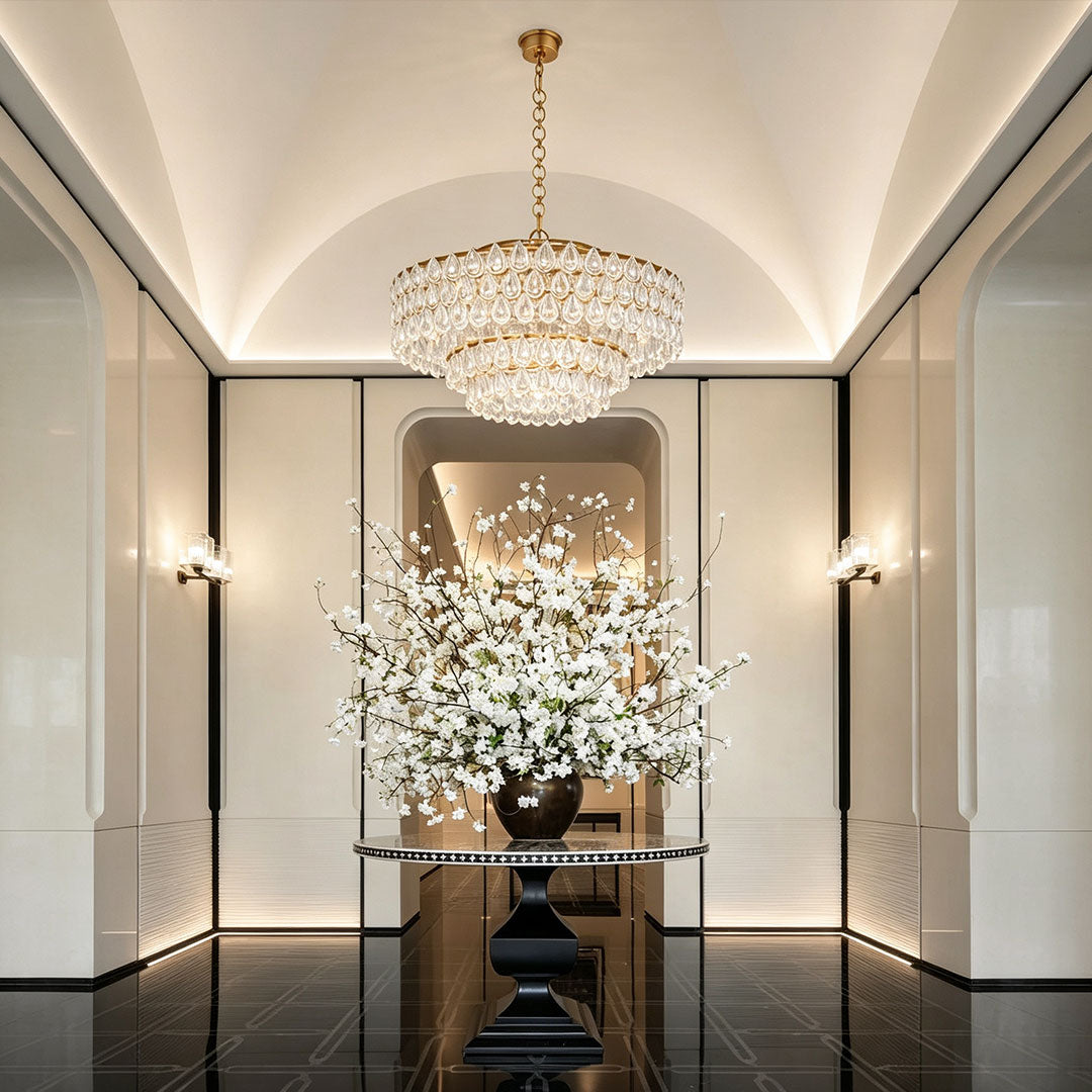 Crystal glass chandelier in a modern hallway, copper ring ceiling light with warm illumination