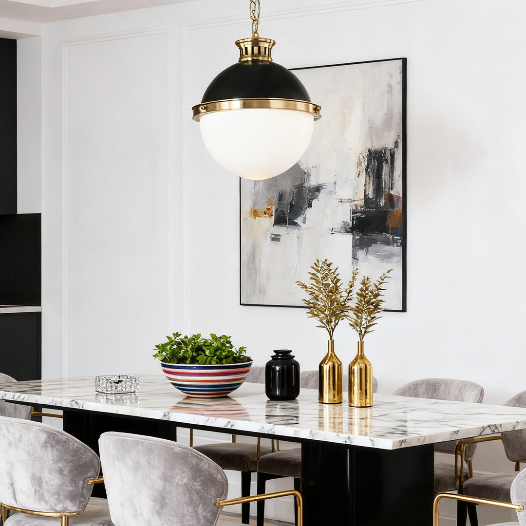 Aureon glass ball pendant light in a kitchen with subway tile and open shelving