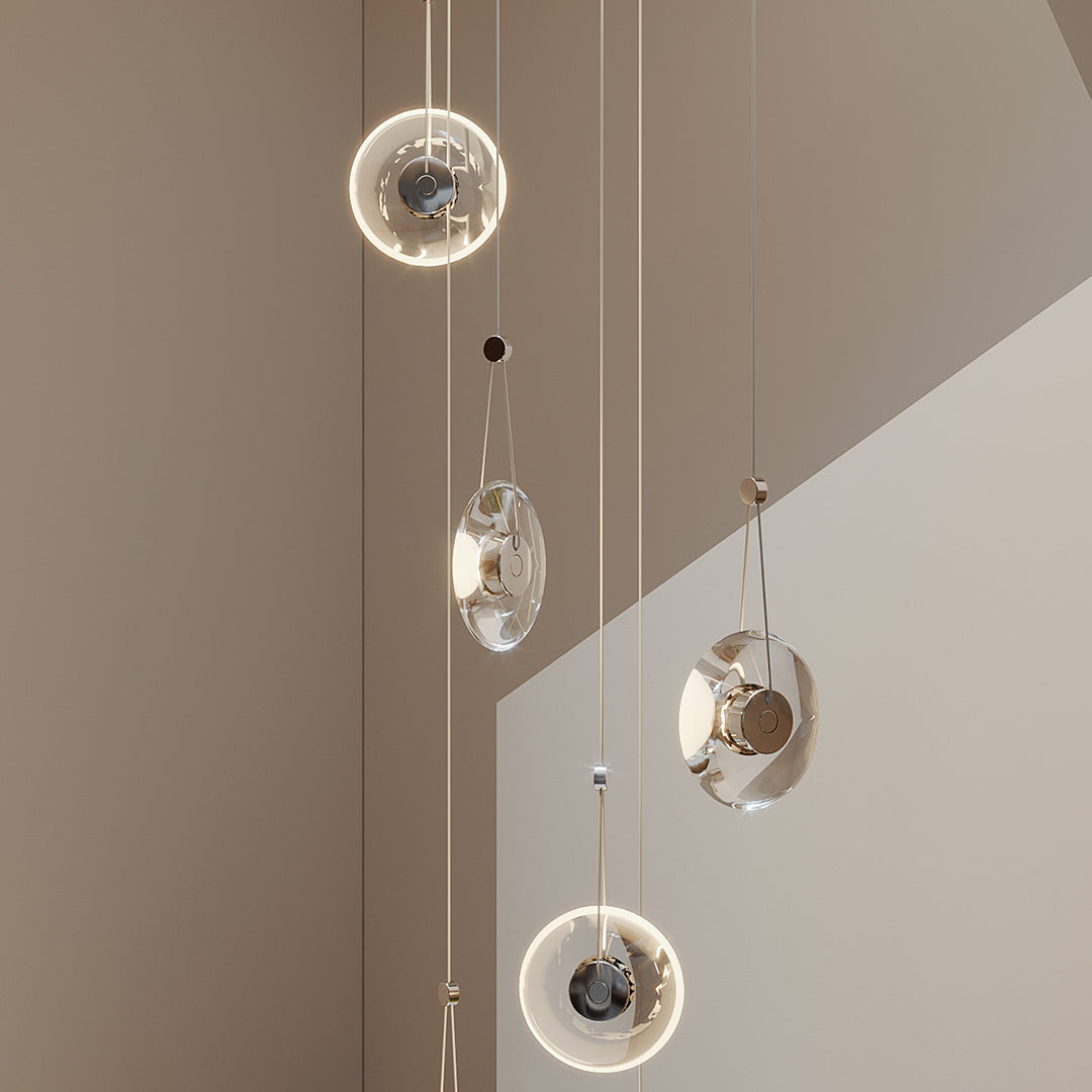 Close-up detail of Aureon crystal pendant light showing transparent frame and crystal elements
