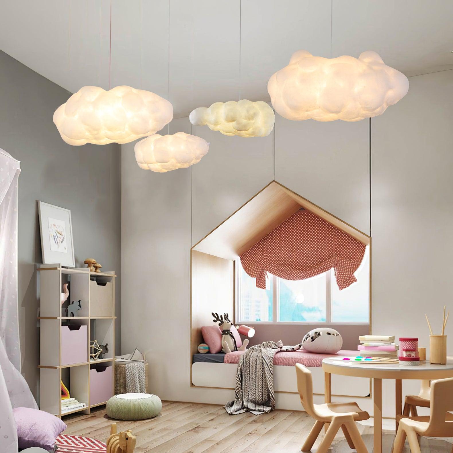 Cloud pendant light above a kids' bedroom bed, soft fabric shade casting warm light