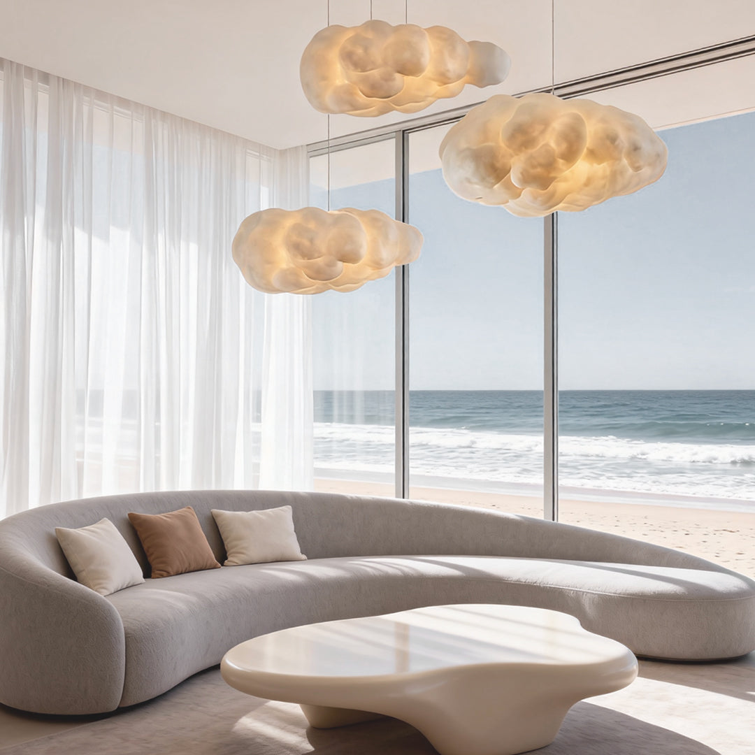 Cloud fabric pendant light in a seaside-inspired living room with warm LED light