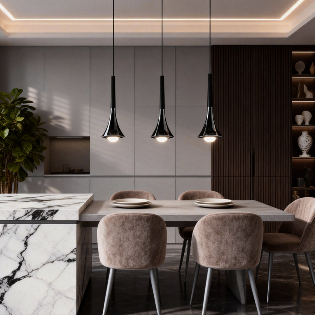 Aureon teardrop pendant light above a modern dining room table, interior lifestyle shot