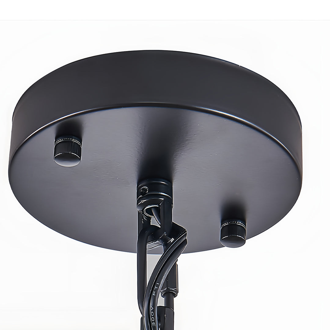 Aureon black iron pendant light in a cosy kitchen dining area