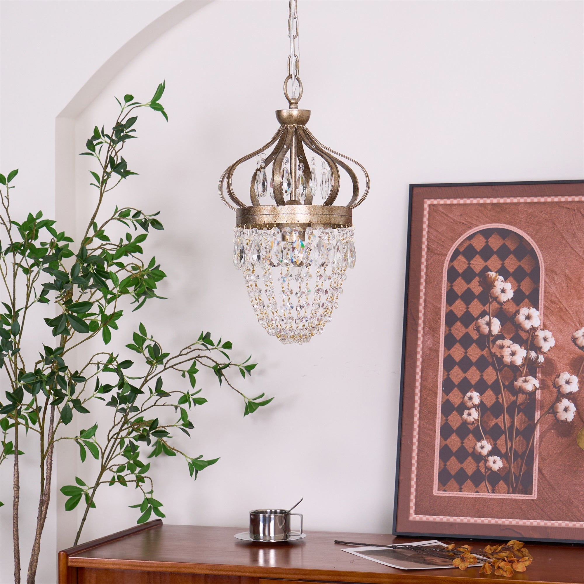 Large Vantara crystal chandelier above an open-plan dining and living space