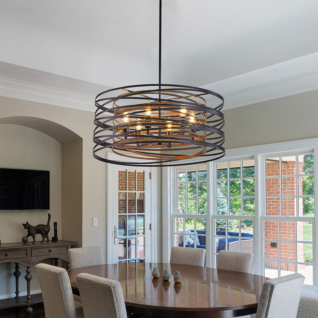 Aureon black drum pendant light hanging above a dining table in a contemporary interior