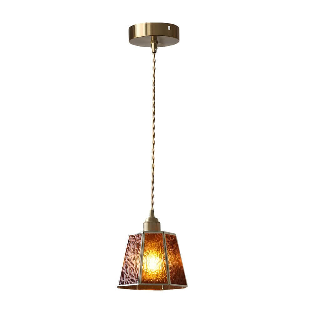 Aureon pendant light in transparent glass with brass fittings in a modern interior corridor