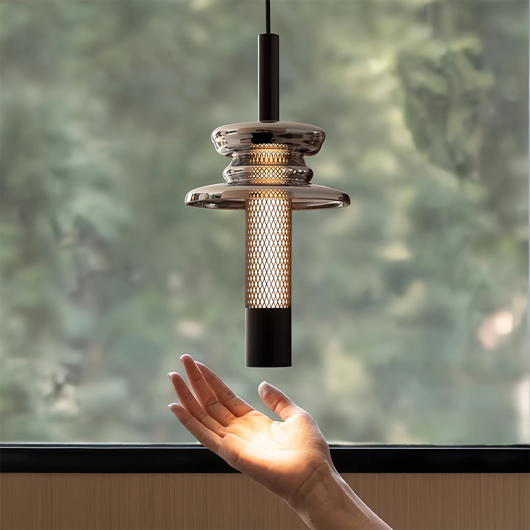 Aureon black iron and hand-blown glass pendant light, close detail of shade and cylinder form