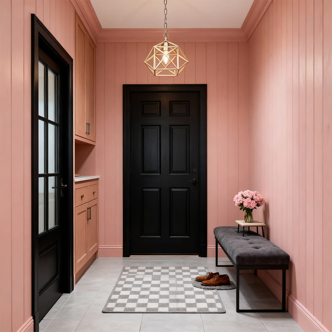 Aureon gold geometric pendant light in a modern mudroom with pink panelling