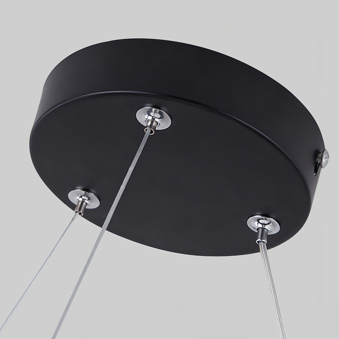 Top-down view of Aureon geometric pendant light canopy mount and ceiling fitting
