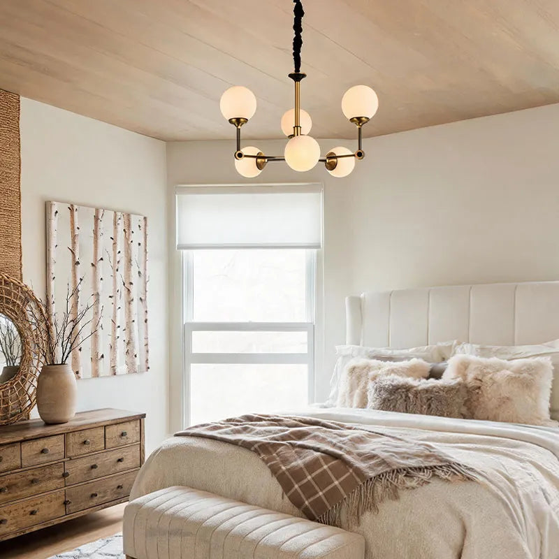 Auréline glass ball chandelier in a modern bedroom, 6-head configuration