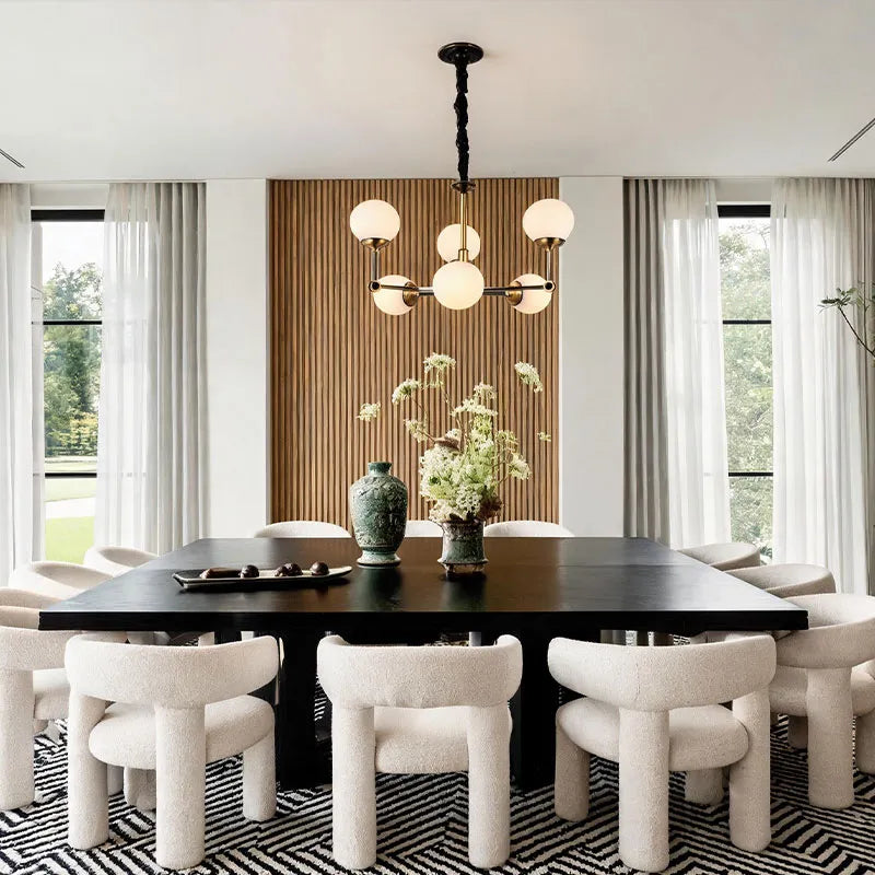 Auréline glass ball chandelier over a dining area, 12-head variant