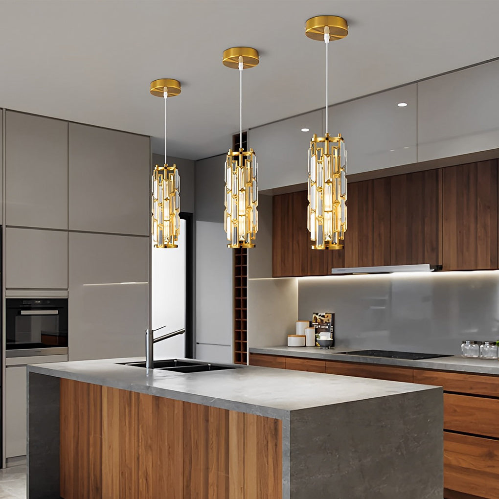Gold mini crystal pendant lights above a kitchen island in a contemporary setting