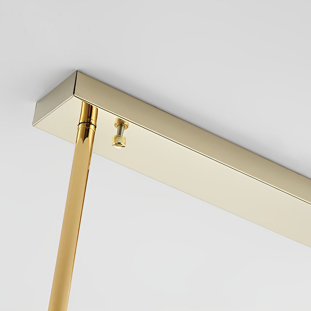 Close-up of the crystal bar structure and gold frame of a modern rectangular chandelier