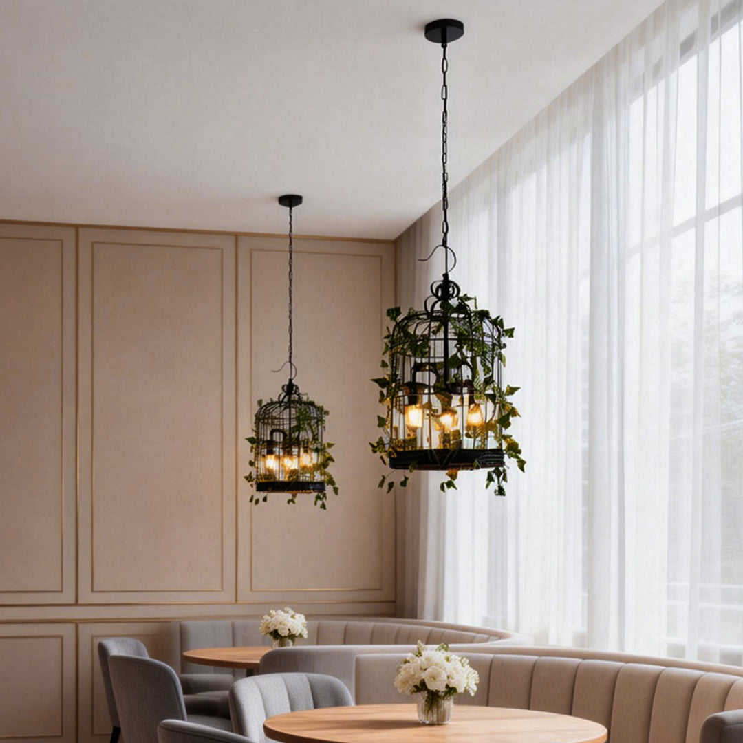 Aureon iron cage pendant light above a modern indoor dining area with warm ambient glow